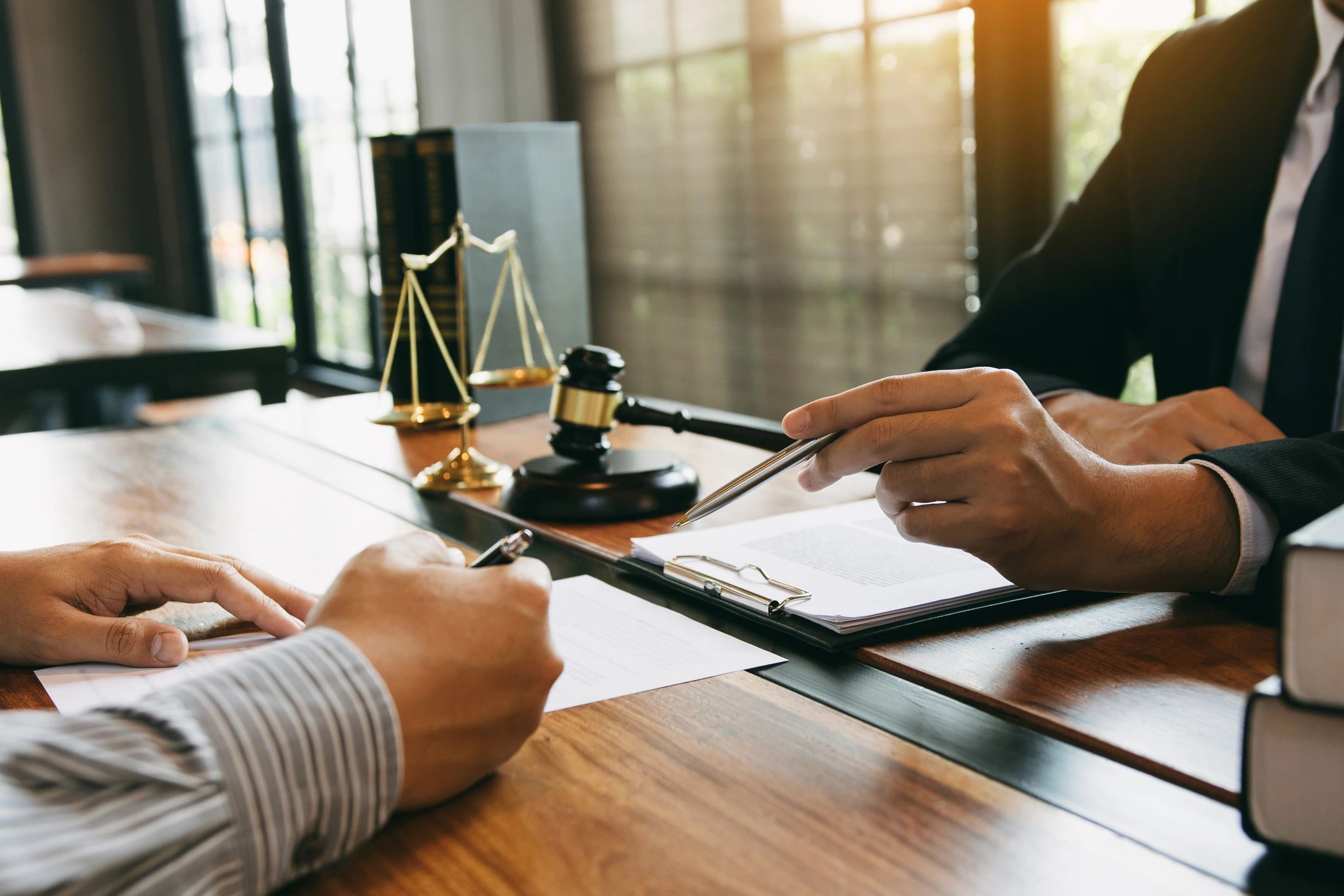 Legal paperwork and court filings being prepared